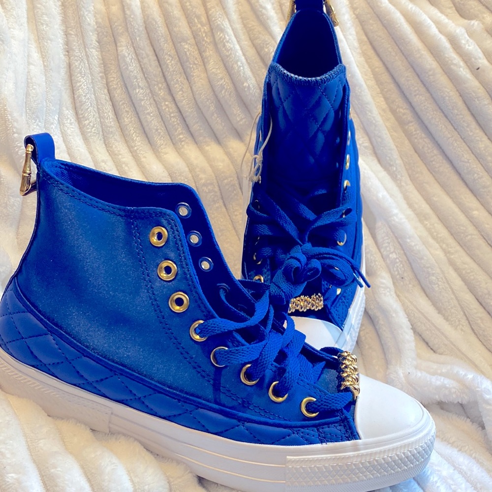 Blue Converse sneakers